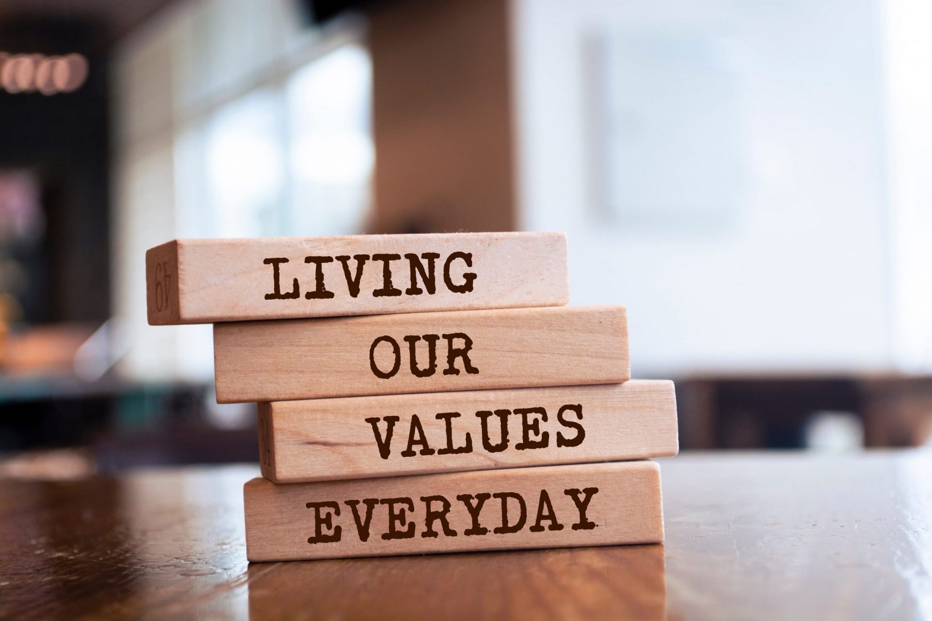 wooden blocks with words living our values everyday